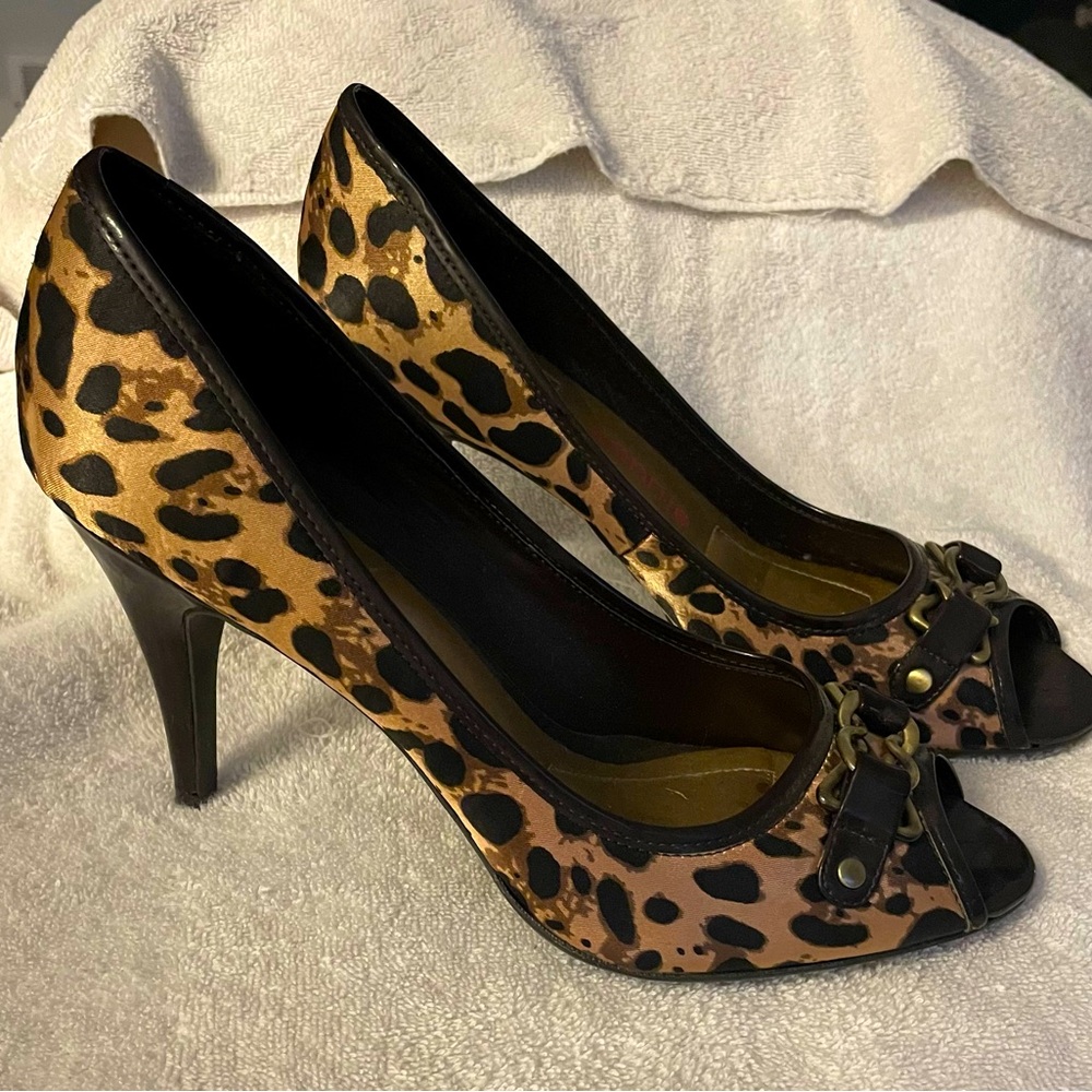 Opened toe cheetah print heels size 11 like new.
